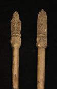 A Maori Taiaha long club fighting staff, with stone carved upoko, 6ft 10in. together with a