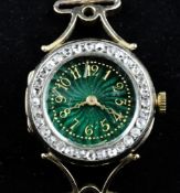 A lady`s gold and diamond set Certina dress wrist watch, with green guilloche enamelled Arabic