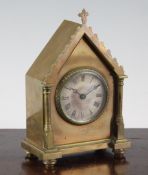 A 19th century French brass travelling timepiece, with architectural case and circular silvered