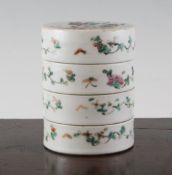 A Chinese famille rose four section cylindrical box, late 19th / early 20th century, the cover