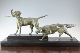 C. Masson. A bronzed spelter group of two hounds, one with a pheasant, signed on black marble
