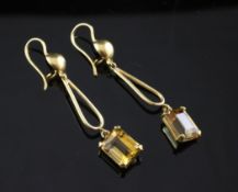 A pair of middle eastern 18ct gold and citrine set drop earrings, 2.5in.