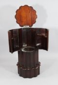 A Victorian circular mahogany marble top pedestal cupboard, later adapted to a drinks cabinet, H.2ft