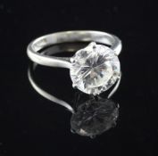 An 18ct white gold and platinum set solitaire diamond ring, the round brilliant cut stone