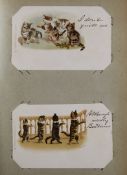 Three Edwardian and later postcard albums, containing English and continental topography, cats and