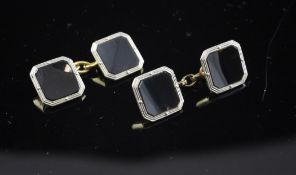 A pair of 1930`s/1940`s 18ct gold, platinum and black onyx octagonal cufflinks.