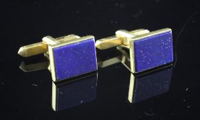 A pair of 1960`s 18ct gold and lapis lazuli set cufflinks, of rectangular form, gross 12.6 grams.