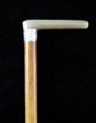 A modern horn handled and malacca walking cane, with silver collar, hallmarks for D & N,