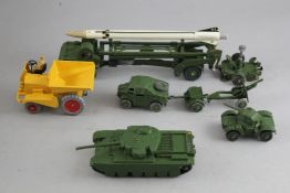A collection of Dinky toys, to include a No.236 Connaught racing car, a No.623 Army covered wagon