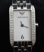 A lady`s stainless steel and diamond set Emporio Armani quartz wrist watch, with rectangular