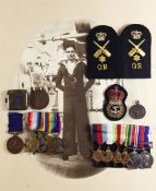 A WW1/WW2 family group of Naval/Life Saving medals comprising WW1 trio, GV Royal Fleet Reserve LSGC,