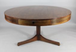 Robert Heritage for Archie Shine. A circular rosewood drum table, with four frieze drawers, on