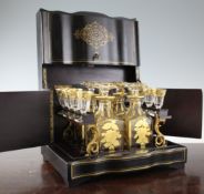 A 19th century French ebonised and red boulle inset liqueur casket, fitted interior with set of four