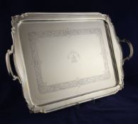 A George VI silver two handled tea tray by Goldsmiths & Silversmiths Co Ltd, of shaped rectangular