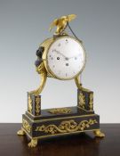 A French Empire ormolu and bronze repeating mantel clock, with drum case surmounted by an eagle