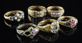 Six late Victorian gold and gem set dress rings, four stamped 15ct, one 12ct and one unmarked, gross