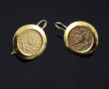 A pair of middle eastern gold coin earrings, of disc form, each set with a Persian gold coin,
