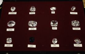 A cased set of eleven paste reproductions of famous diamonds and one sapphire.