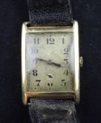 A gentleman`s late 1920`s Swiss 18ct gold manual wind wrist watch, with rectangular Arabic dial