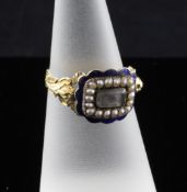 A William IV gold, enamel and seed pearl memorial ring, with hairwork plaque within seed pearls