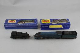 A Hornby Dublo 3218 2-6-4 tank locomotive, boxed with original booklet, a Hornby Dublo EDL12 Duchess