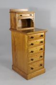 A Victorian Gillows satinwood pedestal chest, of six graduated drawers with a raised superstructure,