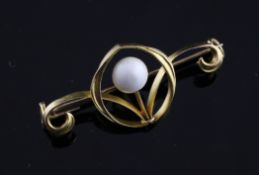 An Art Nouveau style 14ct gold and mabe pearl scroll bar brooch, maker, J.T. 1.5in.