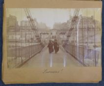 An album of sixteen late Victorian sepia photographs of Brighton, principally the seafront showing