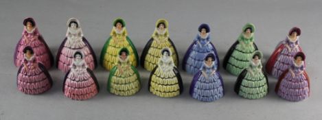 A set of fourteen Carlton ware crinoline lady napkin holders and table bells, in seven different