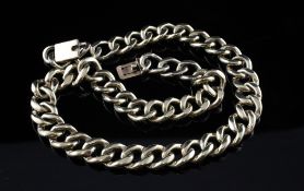 A 9ct gold curb link necklace, unmarked, 17in, 108.8 grams.
