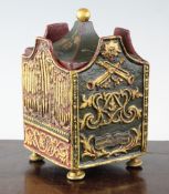 An early 19th century continental painted and gilt lead tea caddy, modelled as a church organ, 6.