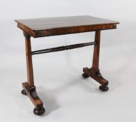 A Regency mahogany side table, with tapered supports and stylised leaf carved bun feet, W.2ft 8in.