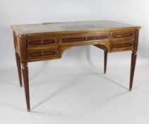 A 19th century French mahogany writing table, with an arrangements of five drawers opposing dummy