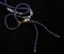 A 20th century Indian? gold, diamond, sapphire and white opal bead necklace, with disc shaped