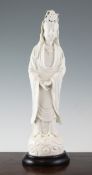 A Chinese blanc de chine standing figure of Guanyin, Dehua, 18th century, wearing long flowing