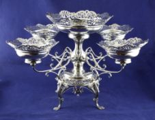 An Edwardian silver epergne, by Walker & Hall, with engraved inscription and baluster stem with