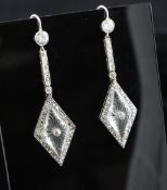A stylish pair of 1930`s 18ct white gold, diamond and rock crystal drop earrings, the diamond shaped