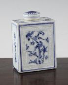 A Chinese blue and white moulded rectangular tea caddy, 18th century, decorated with birds amid