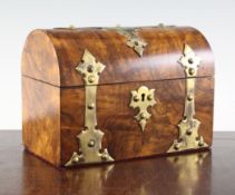 A Victorian walnut and brass mounted dome top tea caddy, 9in.