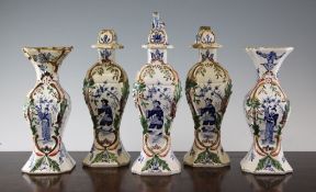 A Delft garniture of five vases with three covers, 19th century, each painted in blue with Chinese