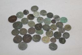 A collection of thirty eight Roman bronze coins, 2nd-3rd century A.D., varying design, largest 0.