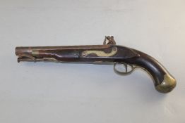 A late 18th century flintlock holster pistol, by Manton, with brass mounted mahogany stock, 15.5in.