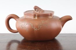 A Chinese Yixing pottery melon lobed teapot, the body incised with prunus and a calligraphic