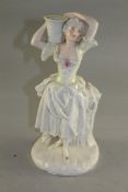A Royal Worcester lustre figural candlestick, mid 19th century, modelled as a lady in 18th century