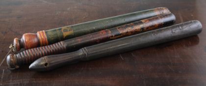 Two William IV painted wood truncheons and a Victorian Constables truncheon, largest 18in.