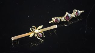 Two Edwardian gold, garnet and seed pearl set bar brooches, bug and graduated stone, 1.5in et