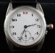 A gentleman`s 1920`s silver manual wind wrist watch, with Arabic dial and subsidiary seconds.