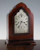 A Regency later cased mantel clock, with gothic arched silvered Roman dial signed Dwerrihouse,