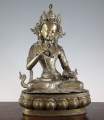 A Chinese bronze figure of a Bodhisattva, probably Vajrasattva, wearing elaborate jewellery, holding