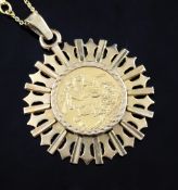 A modern 9ct gold mounted George V gold sovereign pendant necklace, on 9ct gold chain, gross 22.5